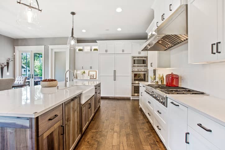 View of kitchen galley with hardwood flooring